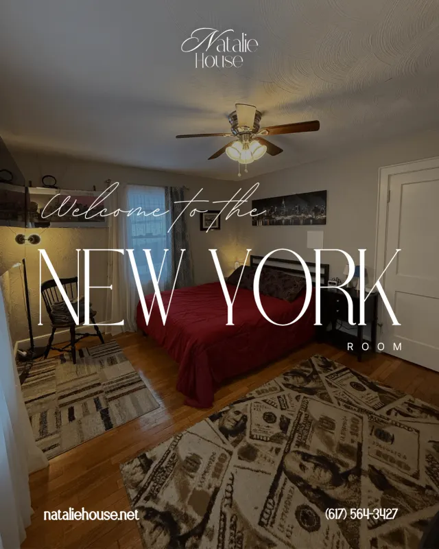 New York room with a red bedspread